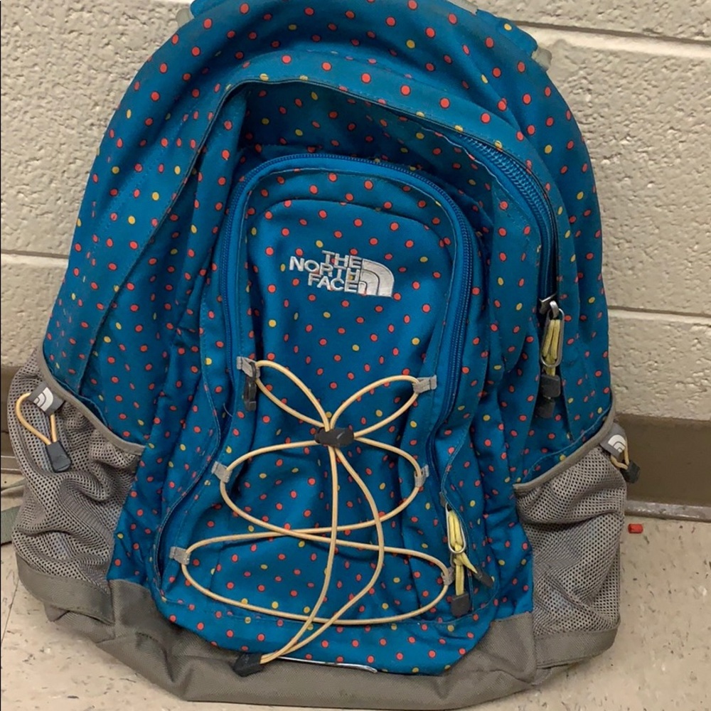 The North Face polka dot backpack